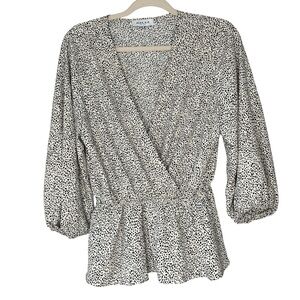 Gilli black and white animal print faux wrap long sleeve blouse. Size L‎